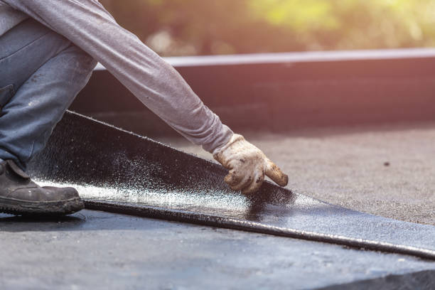Professional Waterproofing technician working in Falmouth, VA